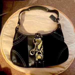 Coach snakeskin purse with front clip closure